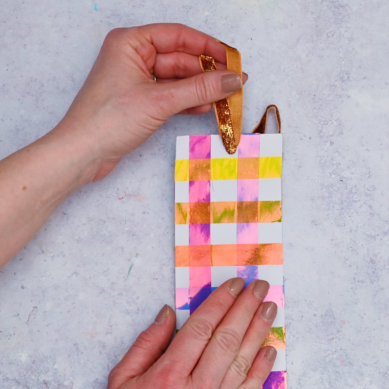 Washi Tape Bookmark Ribbon pulled through hole at the top of the bookmark.