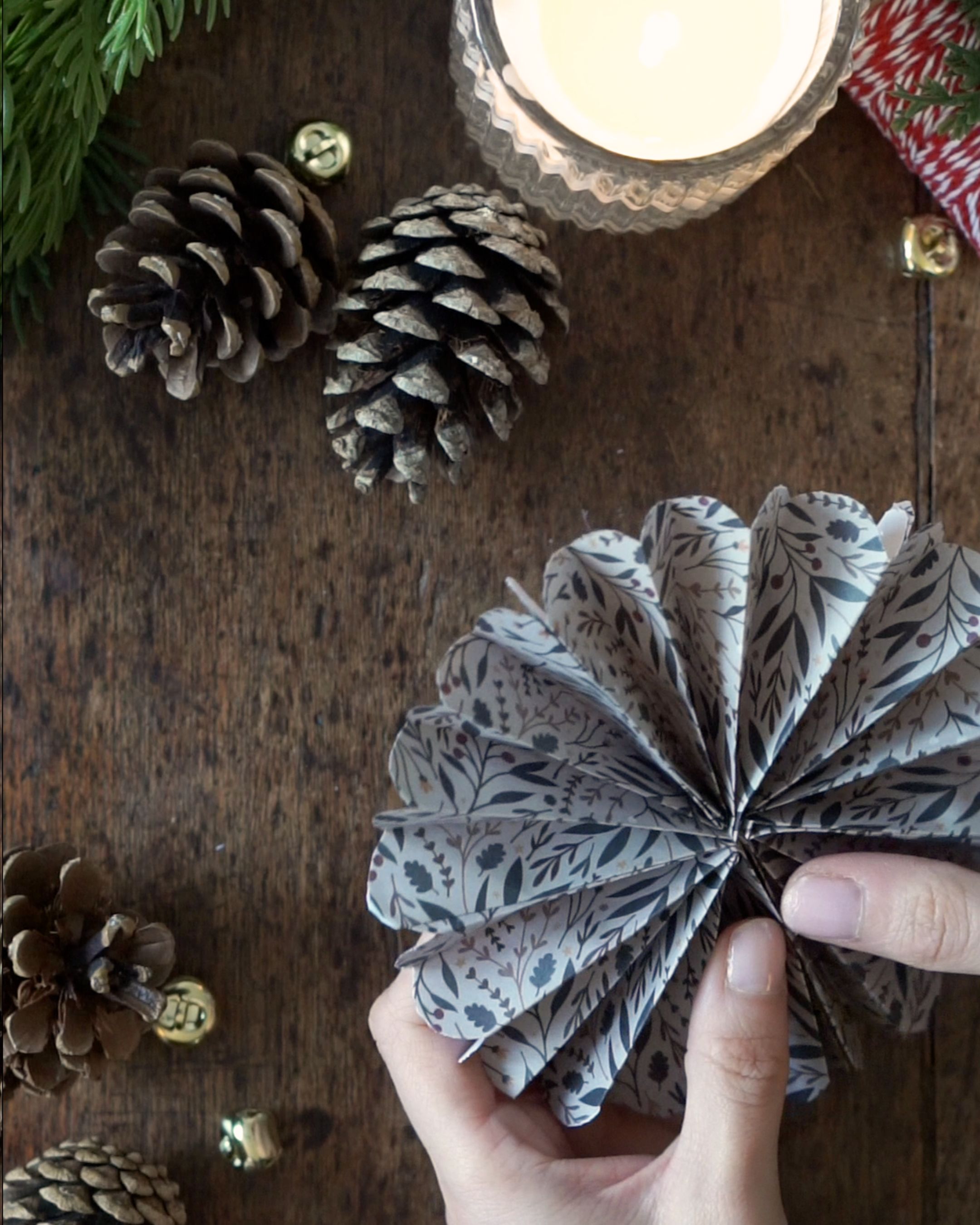 DIY Paper Fan Rosette Step 4 Fan out and join the ends together.