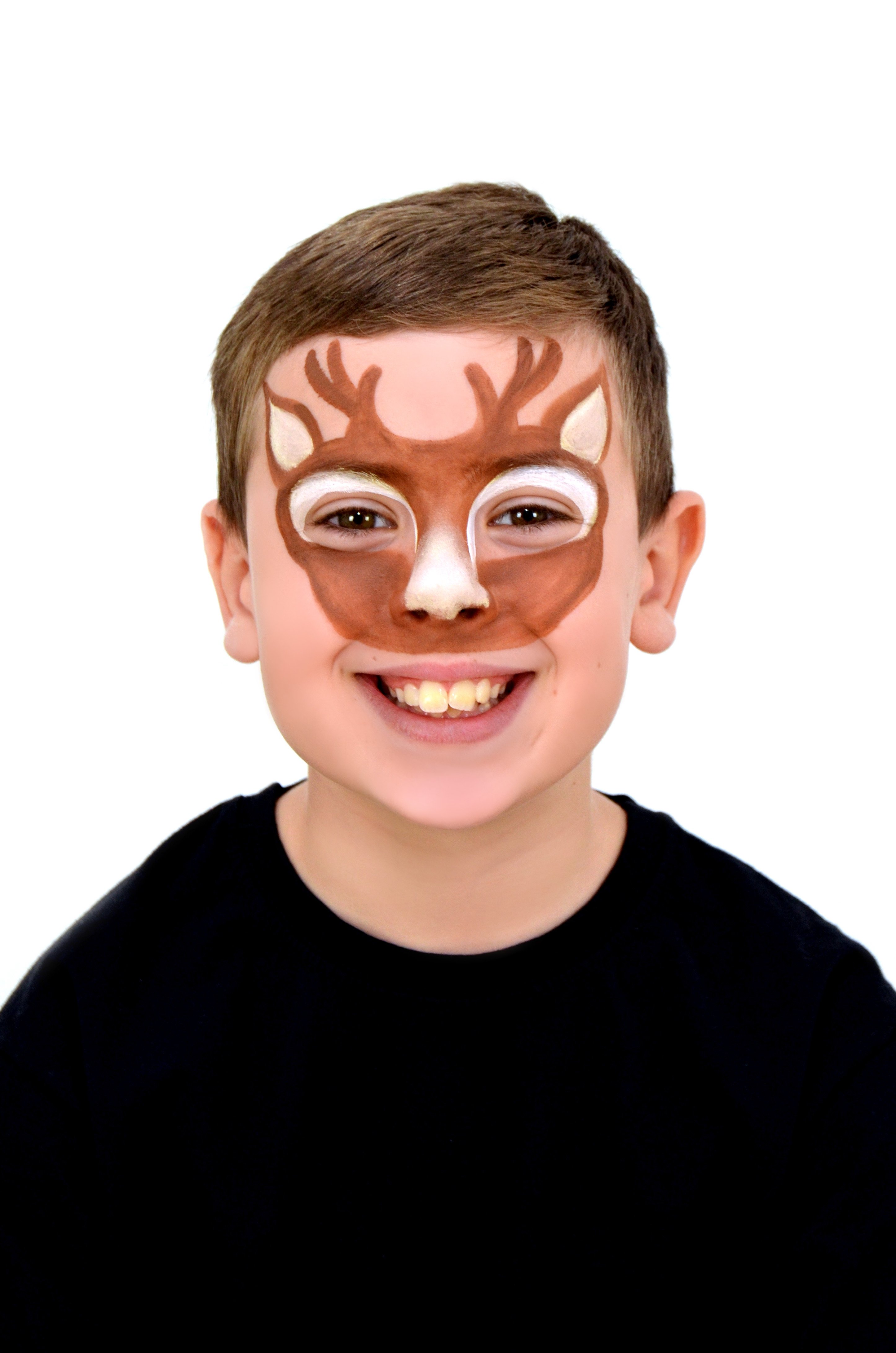 Add depth with white paint to the ears, eyes, and nose.