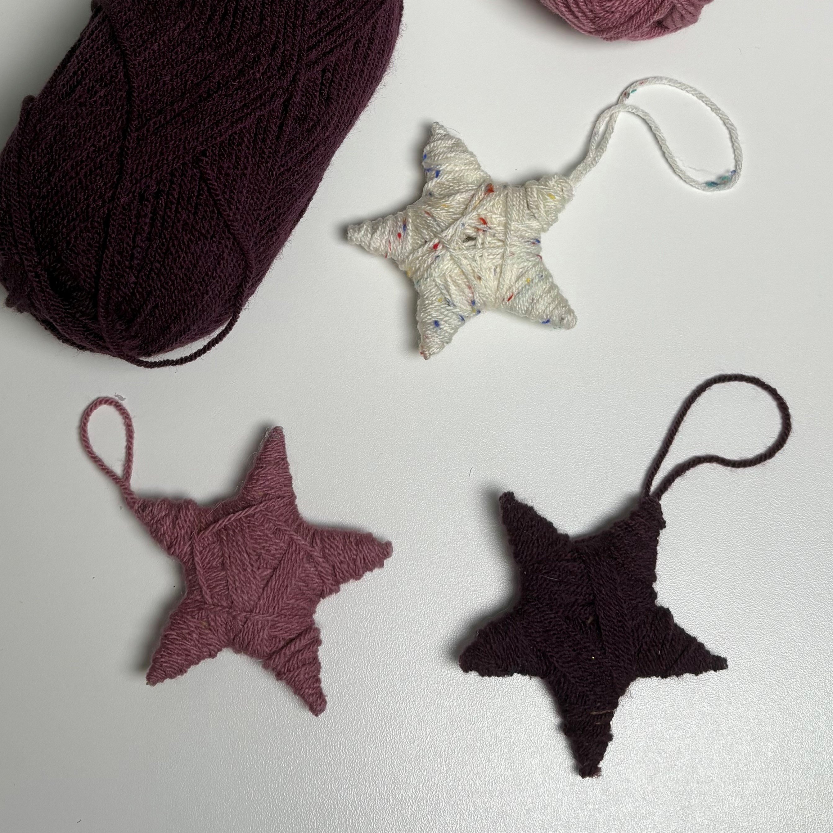 DIY Yarn-Wrapped Star Ornaments Yarn-wrapped star ornaments.