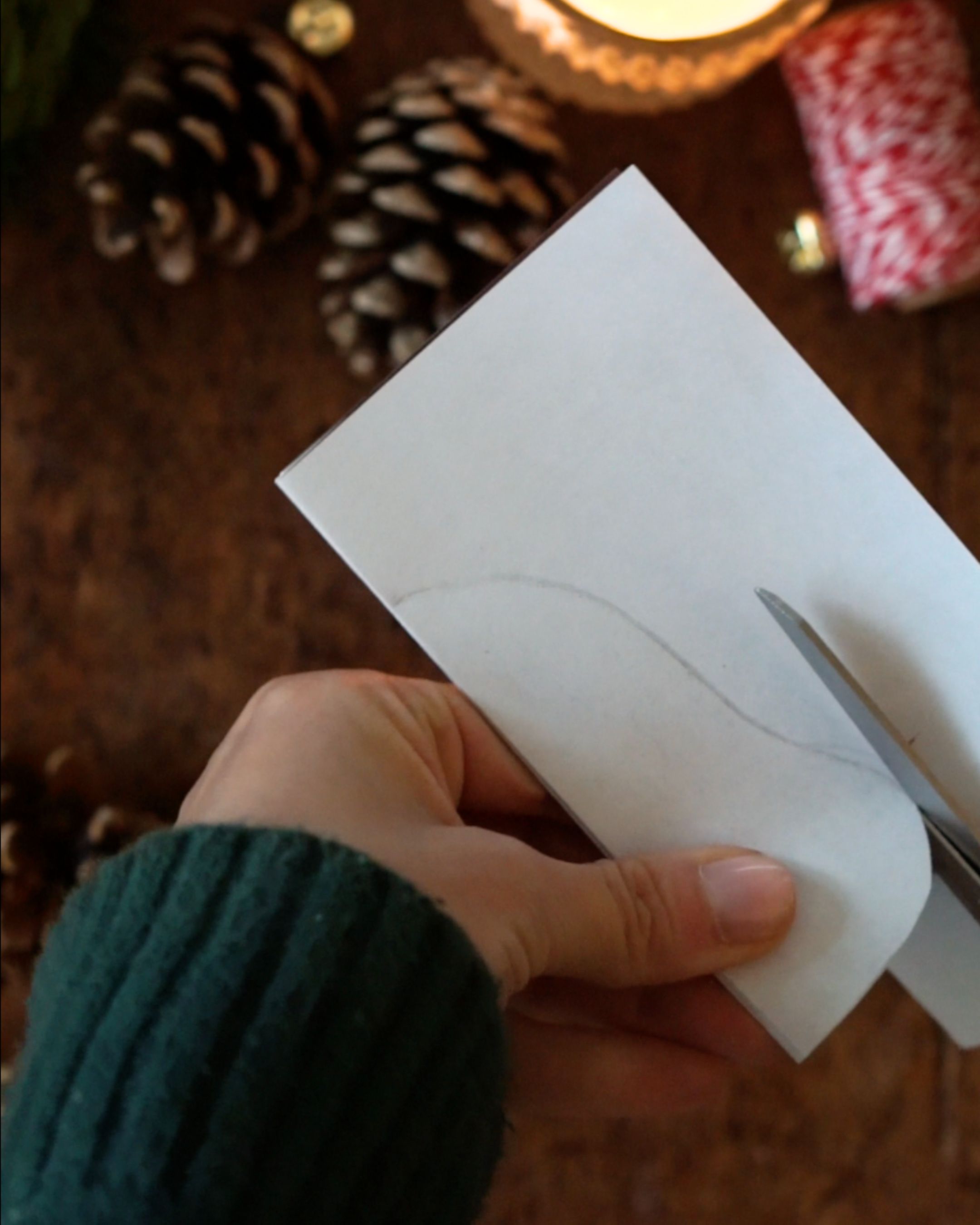 DIY Paper Bell Ornaments Step 5 Cutting out the traced bell.