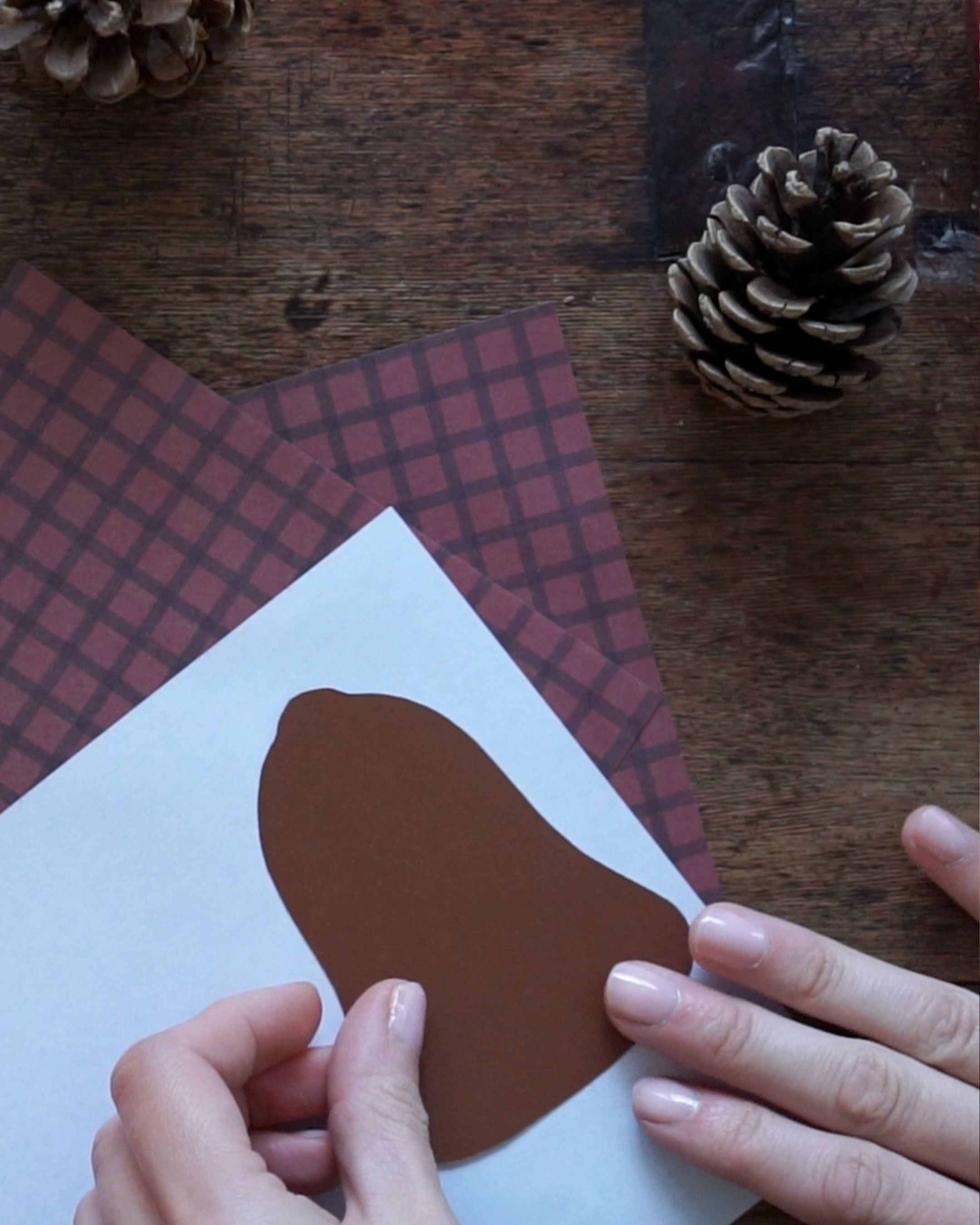 DIY Paper Bell Ornaments Step 3 Cut out stencil of the bell.